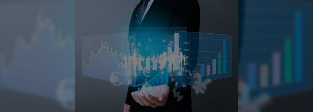 Person in suit holding holographic financial charts